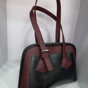 Indulge In luxury With Our Exquisite Women's Handel Bag.